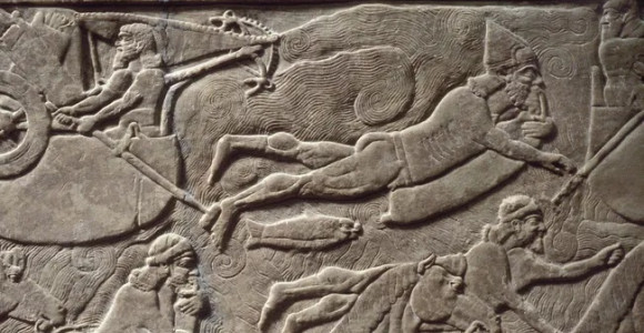 Assyrian swimmers: 2,900-year-old carving of soldiers using inflatable goat skins to cross a river